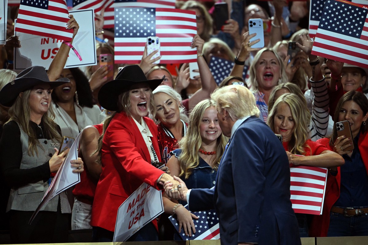 US President Donald Trump shakes hands with attendees as he arrives to speak during the Republican National Midterm Convention at the American Airlines Center in Dallas, Texas on September 9, 2026.
