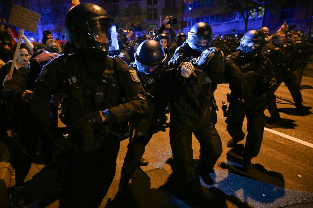 Police detained a protester after a demonstration turned violent in the German city of Frankfurt — Kirill KUDRYAVTSEV / AFP