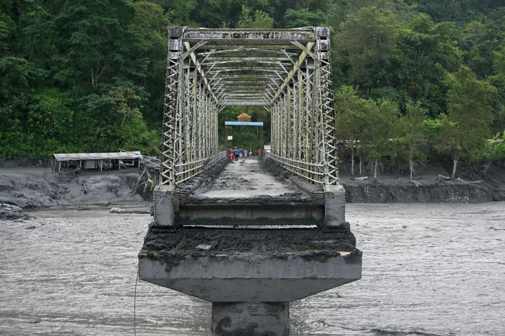 Recurring disasters in Nepal have heightened anxieties in communities living close to rivers descending from the Himalayas, where scientists warn warming temperatures are increasing risks — PRAKASH MATHEMA / AFP