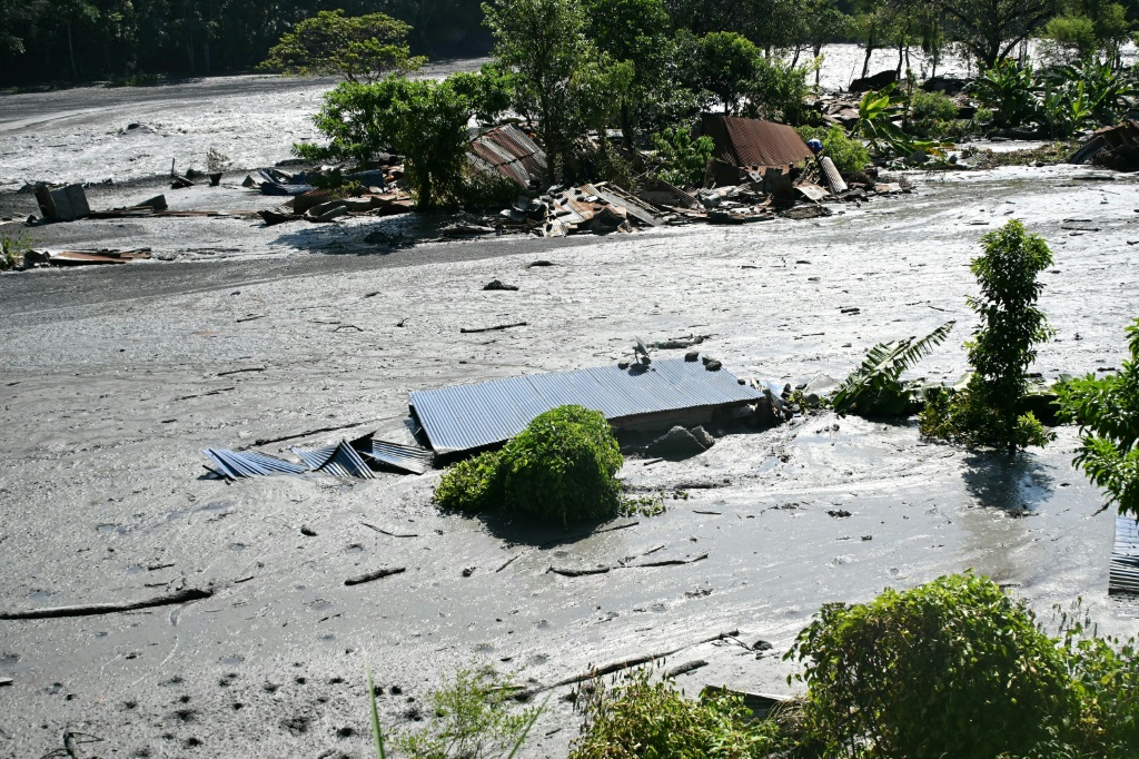 No deaths have been confirmed in Sunday's flooding, but at least six people are missing and three hydropower plants were damaged, according to Nepali disaster officials — Prakash MATHEMA / AFP