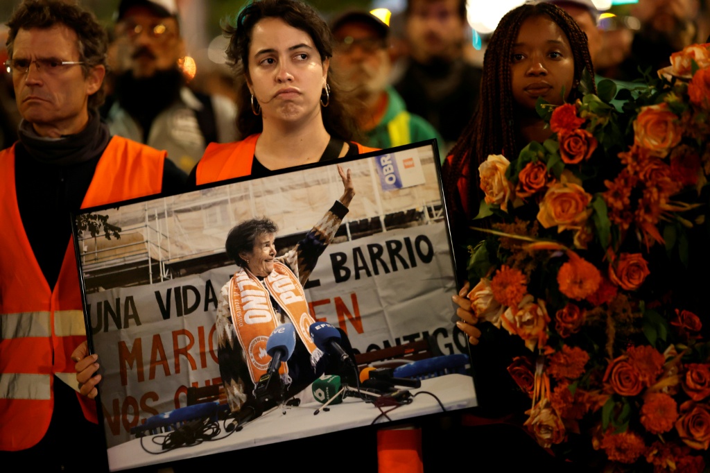 The death of 87-year-old Maricarmen Abascal on Wednesday produced tears and anger in the Spanish capital — Oscar DEL POZO / AFP