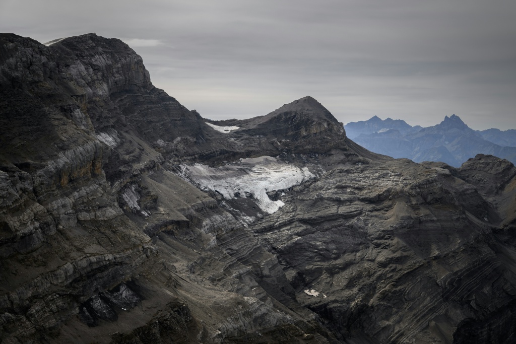 The remains of the now tiny Mauvais glacier above Les Diablerets in the Swiss Alps — Fabrice COFFRINI / AFP