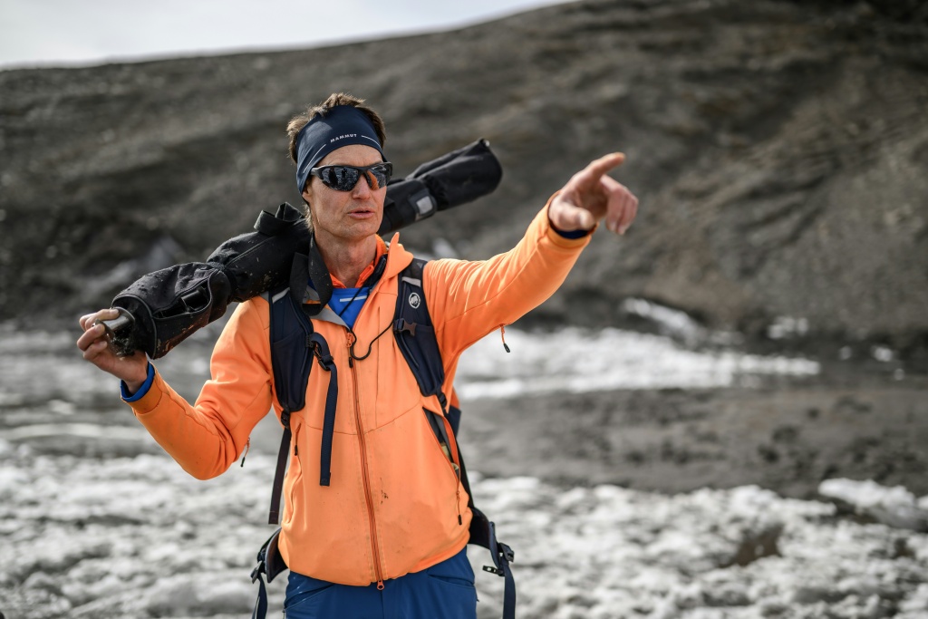Glaciologist Matthias Huss during a visit to record changes in the melting Scex Rouge glacier in western Switzerland — Fabrice COFFRINI / AFP