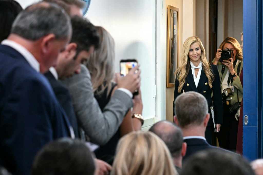 New White House Press Secretary Katie Zacharia took just three questions from the packed room of reporters — Jim WATSON / AFP