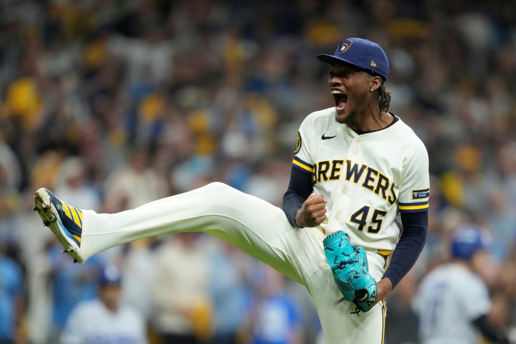 Milwaukee relief pitcher Abner Uribe reacts after recording an out in the Brewers' victory over the Los Angeles Dodgers in game one of the National League Championship Series — Patrick McDermott