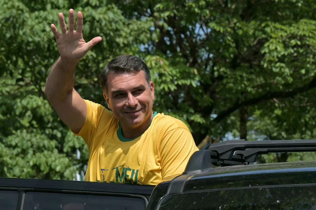If Flavio Bolsonaro wins the election, Brazil will join a growing number of Latin American nations that have swung to the right in recent months — NELSON ALMEIDA / AFP