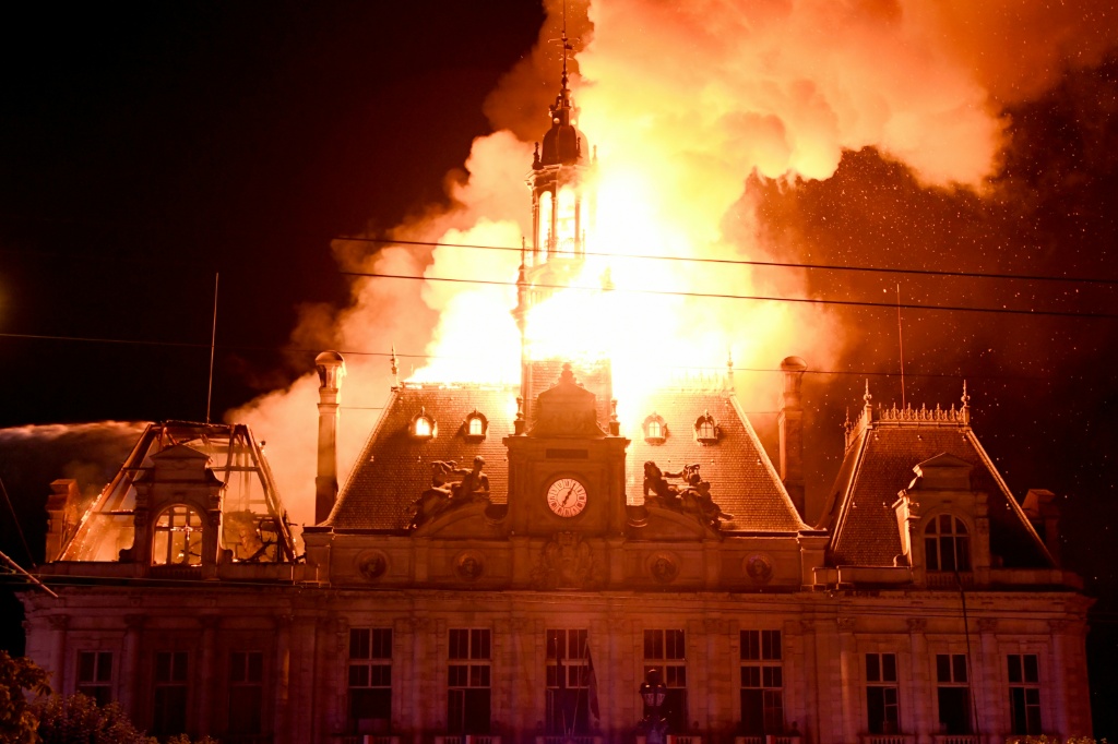 Security forces arrested a man over the burning down of a historic town hall in the central city of Limoges — Pascal LACHENAUD / AFP