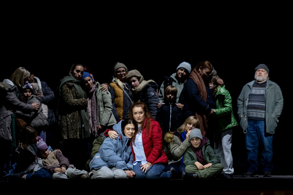 Singers perform during a rehearsal of 'The Mothers of Kherson,' which premiered at the Polish National Opera — Wojtek RADWANSKI / AFP