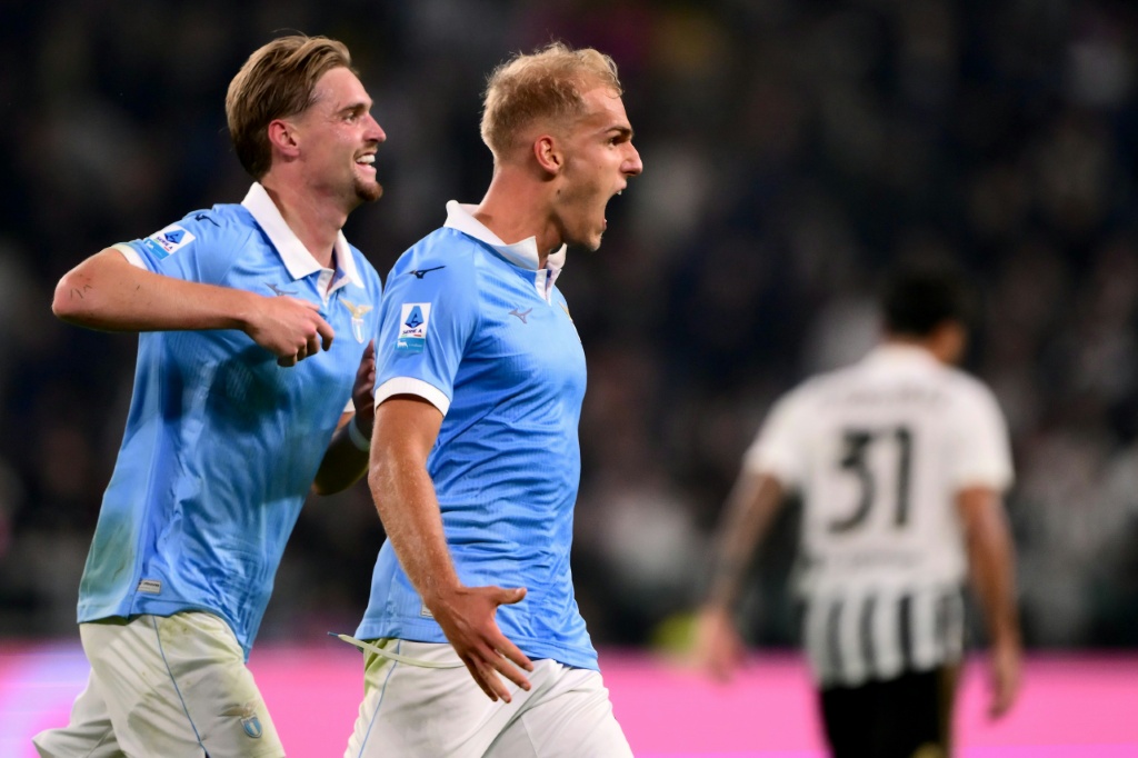 Gustav Isaksen (C) shows his satisfaction after scoring Lazio's second goal at Juventus — Marco Bertorello / AFP