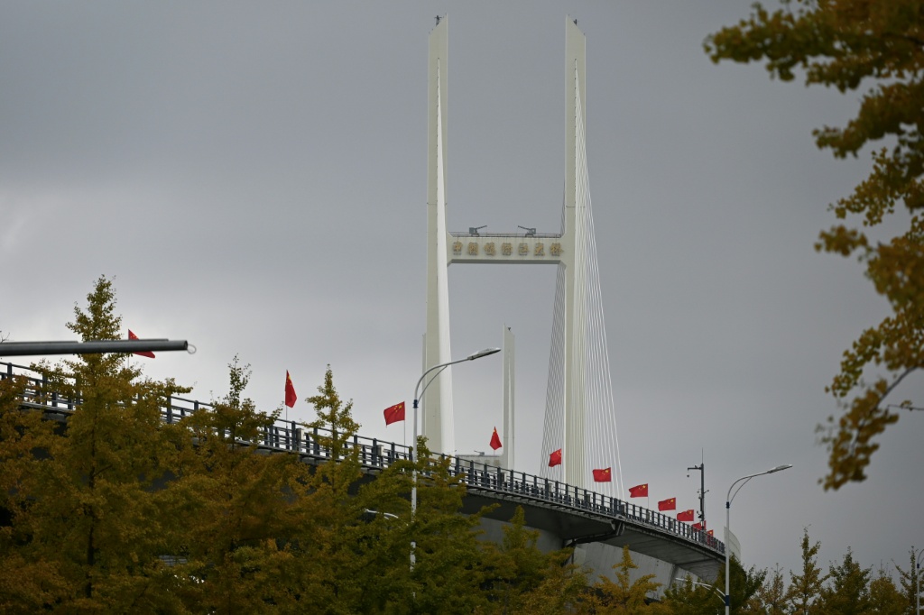 A general view shows the new cross-border bridge linking China and North Korea in Dandong, Liaoning Province, on October 15, 2026. — Michael ZHANG / AFP