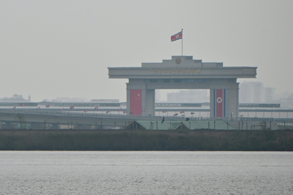 The new four-lane road bridge linking China and North Korea finally opened on October 15, 2026, 12 years late, enabling the Asian giant and its isolated nuclear-armed neighbour to step up cross-border trade substantially. — Michael ZHANG / AFP