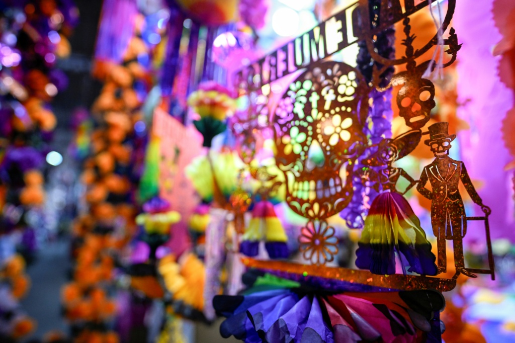 Skulls and skeletons wearing top hats are just some of the designs seen on colorful paper banners during Mexico's emblematic Day of the Dead festival in early November — Alfredo ESTRELLA / AFP