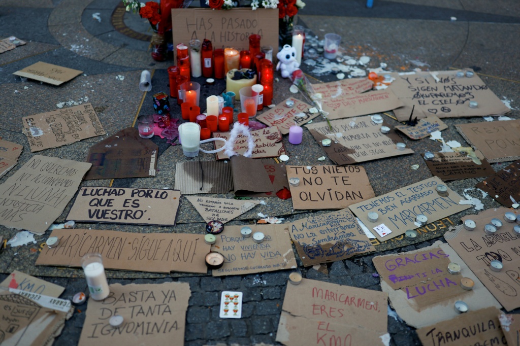 An improvised shrine was set up in Madrid's Puerta del Sol square, the epicentre of the housing protests — Oscar DEL POZO / AFP