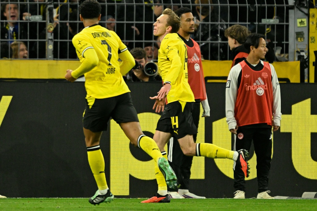 Maximilian Beier celebrates his winner for Borussia Dortmund against Eintracht Frankfurt. — INA FASSBENDER / AFP