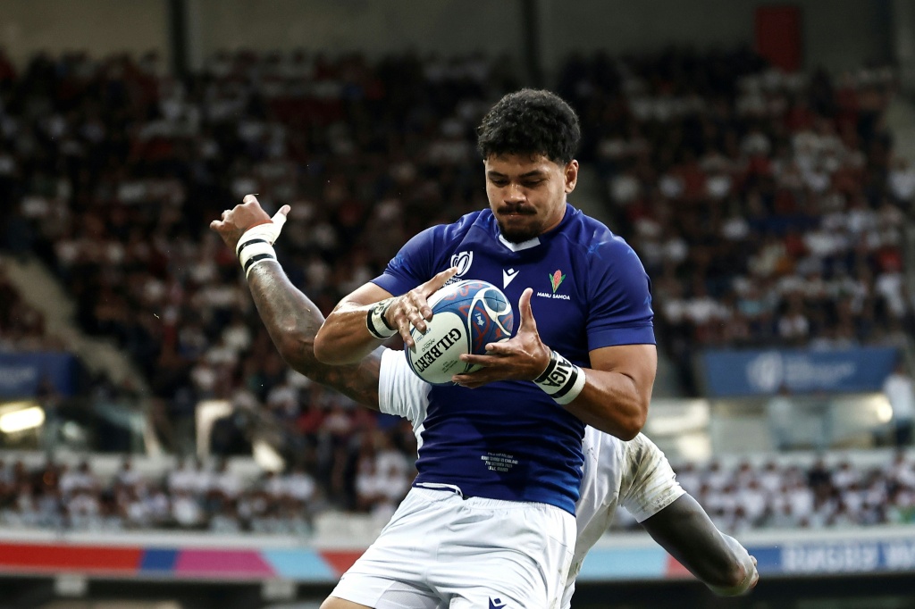 Theo McFarland in action for Samoa at the 2023 Rugby world Cup — Sameer Al-Doumy / AFP