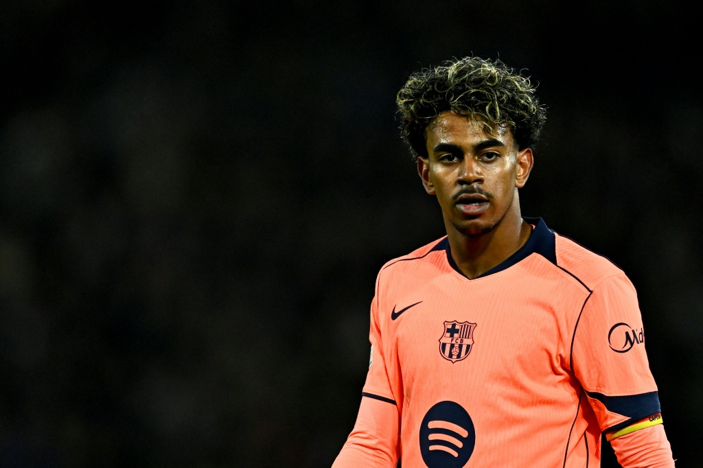 Lamine Yamal in action for Barcelona against PSG in the Champions League on Tuesday — JULIEN DE ROSA / AFP