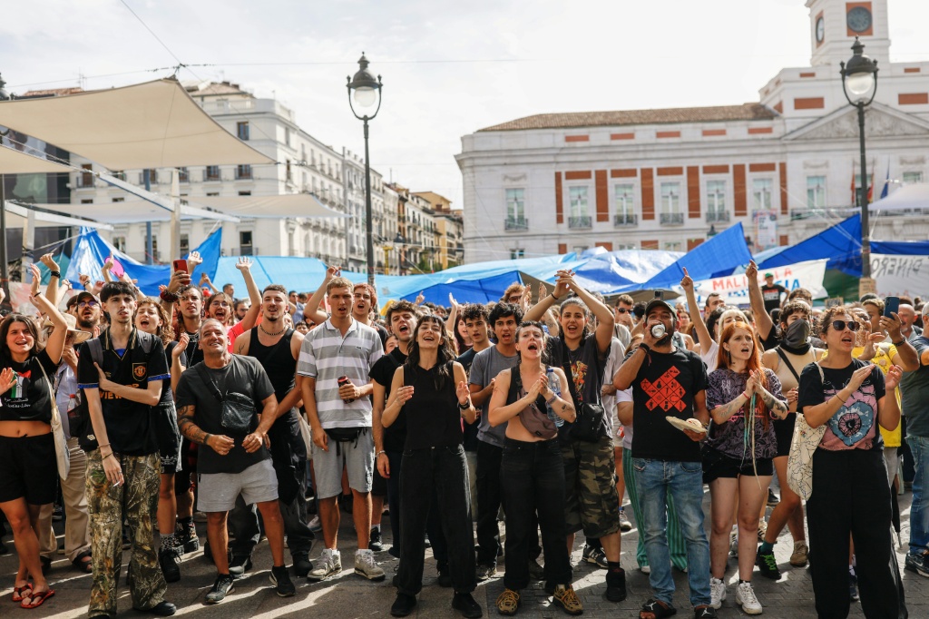 The Madrid regional government has unsuccessfully sought to remove the camp — Oscar DEL POZO / AFP