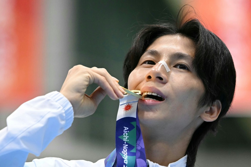 Taiwan boxer Lin wins Games gold as Japan edge North Korea on penalties