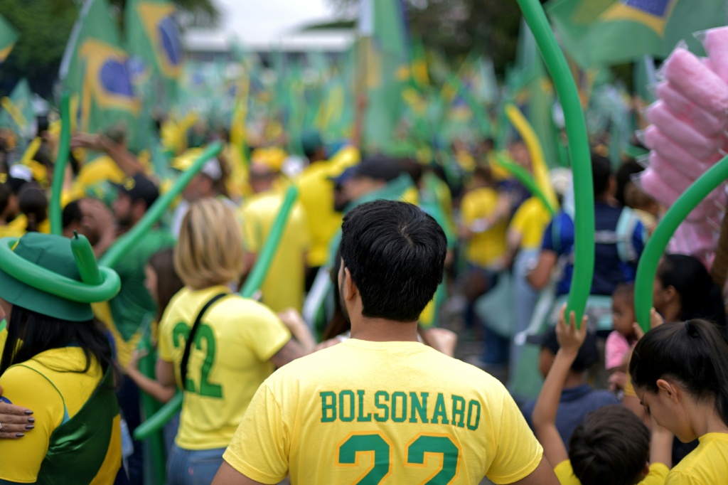 In Belo Horizonte, a crowd of Bolsonaro supporters clad in the national football jersey were joined by hundreds of bikers — DOUGLAS MAGNO / AFP