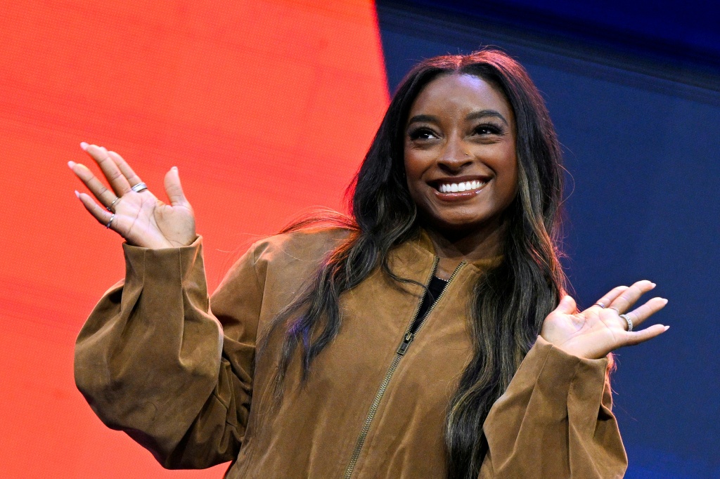 US gymnastics legend Simone Biles greets the public in Rotterdam on the sidelines of the world championships — JOHN THYS / AFP