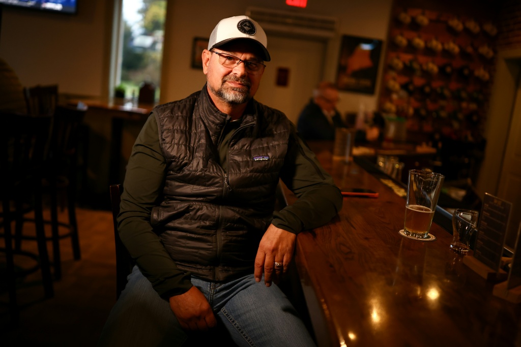 Shawn Pelletier, co-owner of the Northern Maine Brewery Company in Caribou, the hometown of Senator Susan Collins who is running for reelection in a competitive race, says she faces 'a lot headwind' due to rising fuel prices — CHARLY TRIBALLEAU / AFP