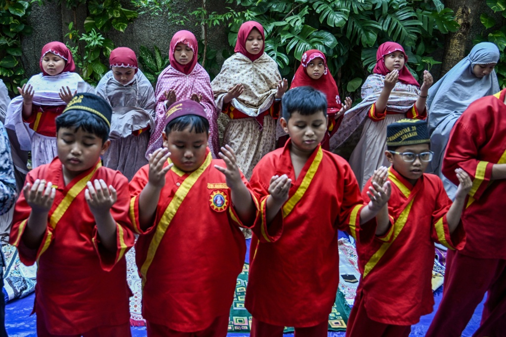 'Solution from the heavens': Indonesians pray for rain as fires burn