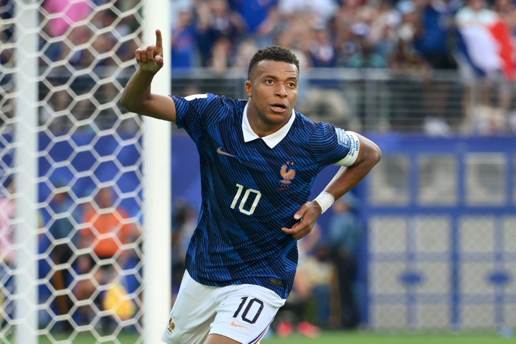 Kylian Mbappe is the all-time record goalscorer in the World Cup — ANGELA WEISS / AFP