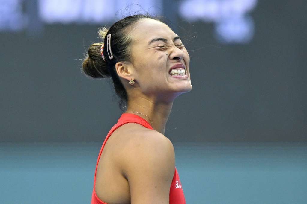 China's Zheng Qinwen reacts during the women's singles second round tennis match Russia's Anna Kalinskaya at the China Open tennis tournament in Beijing on October 3, 2026. — WANG Zhao / AFP