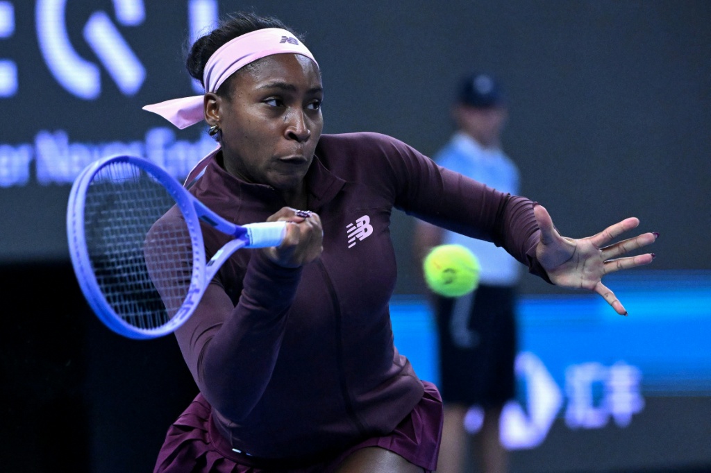 US player Coco Gauff hits a return to China's Sun Xinran during their singles match at the China Open in Beijing — ADEK BERRY / AFP