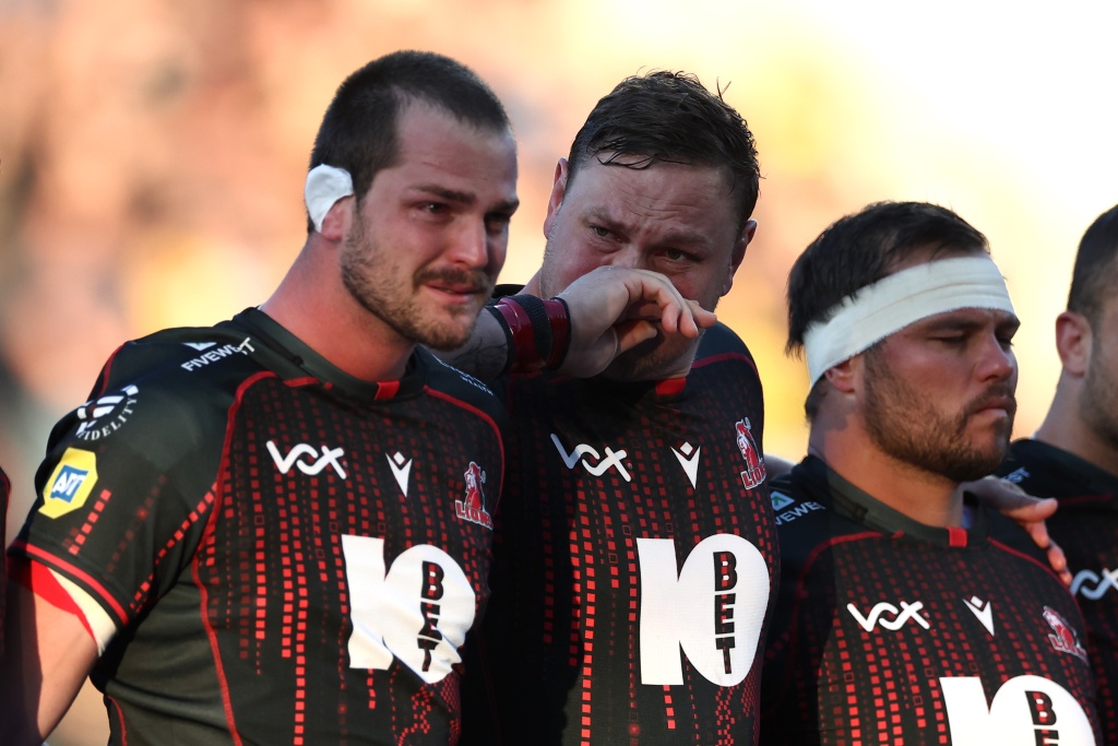 The whole stadium observed an emotional moment of silence in honour of Lions forward Hyron Andrews — ROMAIN PERROCHEAU / AFP
