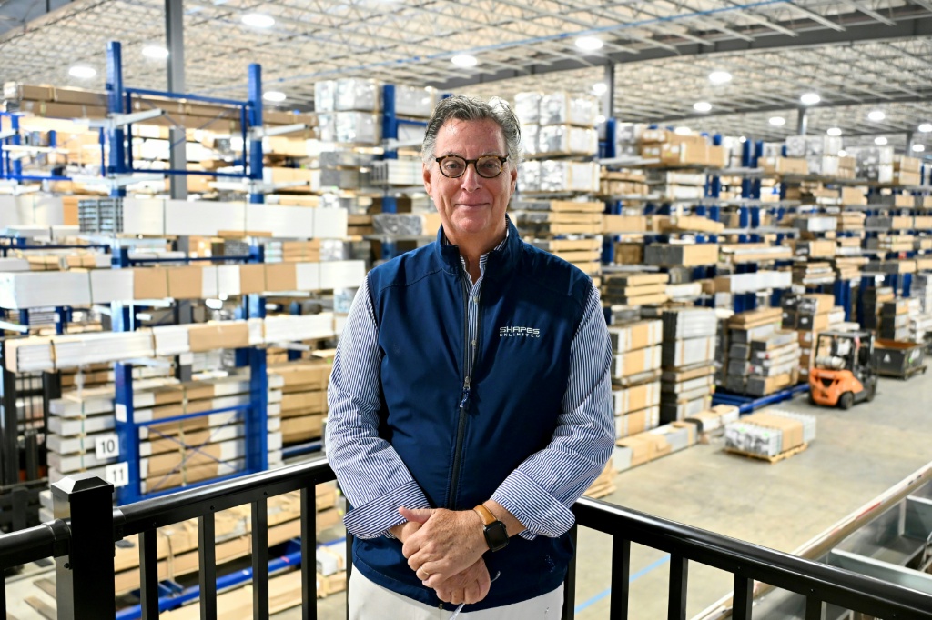 Shapes Unlimited CEO Doug Rende at his company's warehouse — Chloe FERREUX / AFP