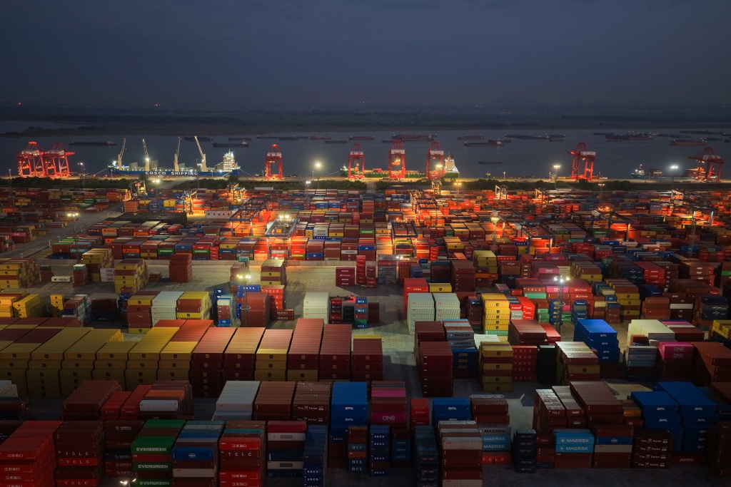 China's economy seen missing target as global shocks bite: AFP poll