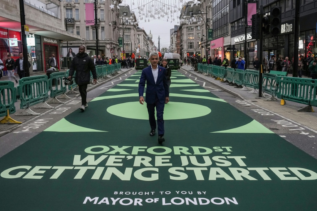 London Mayor Sadiq Khan said part of Britain's most famous shopping area, Oxford Street, had gone permanently traffic-free 'forever' — CARLOS JASSO / AFP