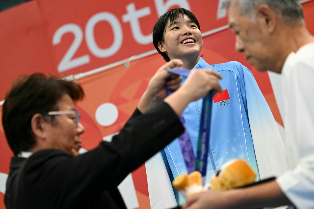 Performers take part in the closing ceremony of the 2026 Asian Games — David GRAY / AFP
