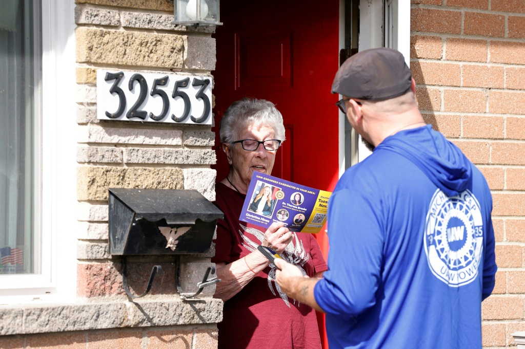 Alongside Iran, the soaring cost of living was a recurring theme for the households visited by canvassers — JEFF KOWALSKY / AFP