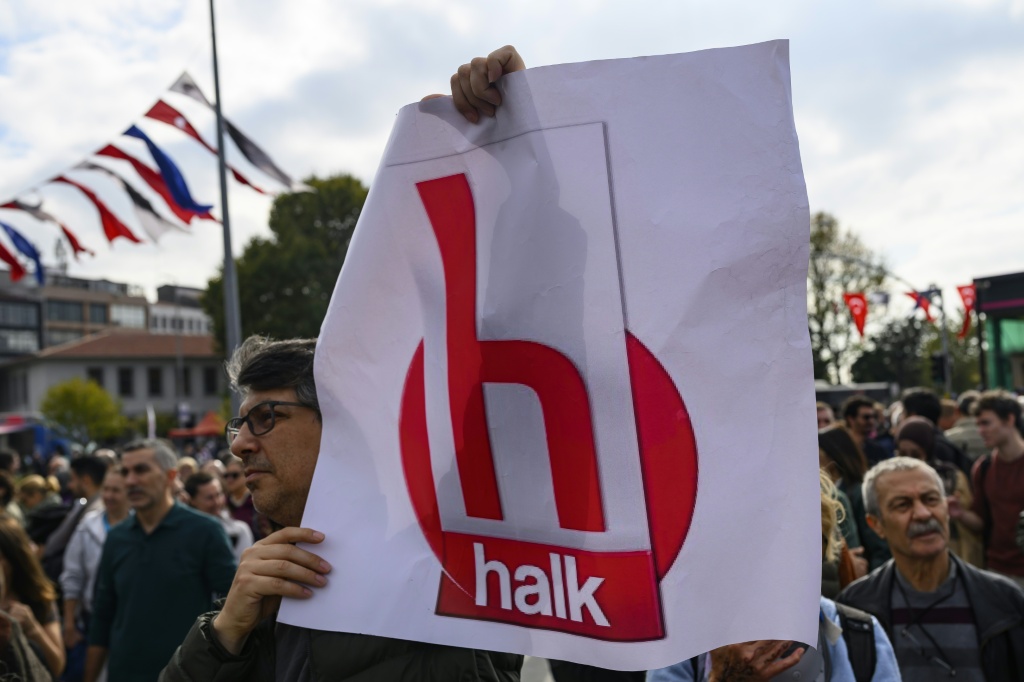 Police raided Turkey's most-watched news channel, Halk TV, halting broadcasts — Yasin AKGUL / AFP