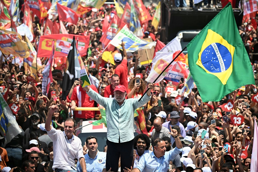 Lula, revered for social welfare programs that lifted millions out of poverty, made a dramatic comeback to office in 2022 elections — MAURO PIMENTEL / AFP