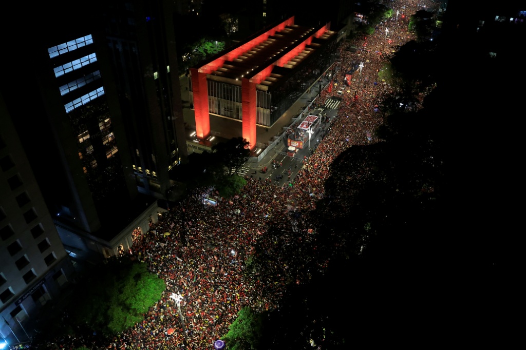 Lula supporters packed Sao Paulo’s main avenue following his election win — Miguel SCHINCARIOL / AFP