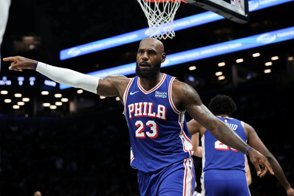 James shines in pre-season debut for re-tooled 76ers