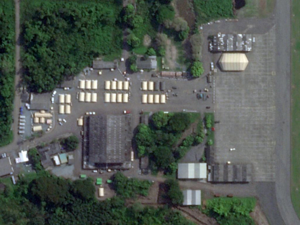 This handout satellite image captured by Planet Labs PBC on October 10, 2026, and analysed by AFP, shows structures whose shape and dimensions are consistent with rapidly deployable modular tents, as well as a larger structure resembling a retractable aircraft maintenance hangar tent, at the Ecuadorean military air base of Taura — Handout / AFP