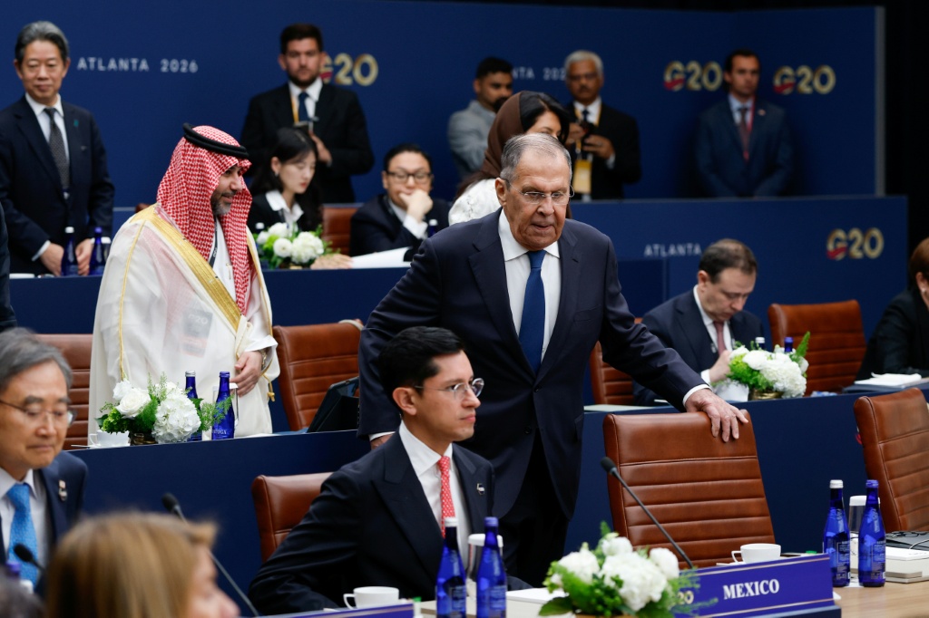 Russia's Foreign Minister Sergey Lavrov arrives to take his seat during the first plenary session at the G20 foreign ministers' meeting in Atlanta, Georgia — Erik S. Lesser / AFP