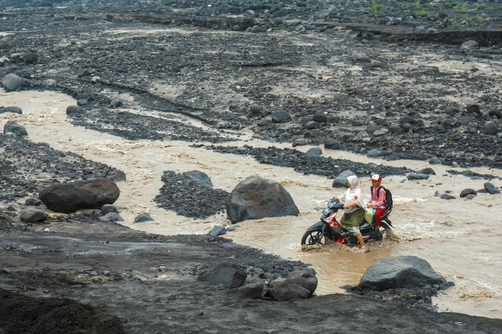 Rains have also fallen in East Java — HAYU YUDHA / AFP