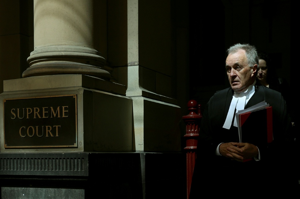 Brendan Kissane (L), Victoria's Director of Public Prosecutions, and Jeremy McWilliams, Crown Prosecutor, leave the Supreme Court of Victoria after the judgement in Erin Patterson's appeal in Melbourne on October 30, 2026. Australian mushroom murderer Erin Patterson lost a bid to overturn her convictions on Friday, failing to prove she was wrongfully blamed for killing three people with a poisoned lunch. — Martin KEEP / AFP