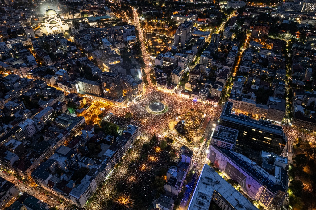 This aerial photograph shows supporters of Serbia's student-led movement attending the final campaign rally — DJORDJE KOSTIC / AFP