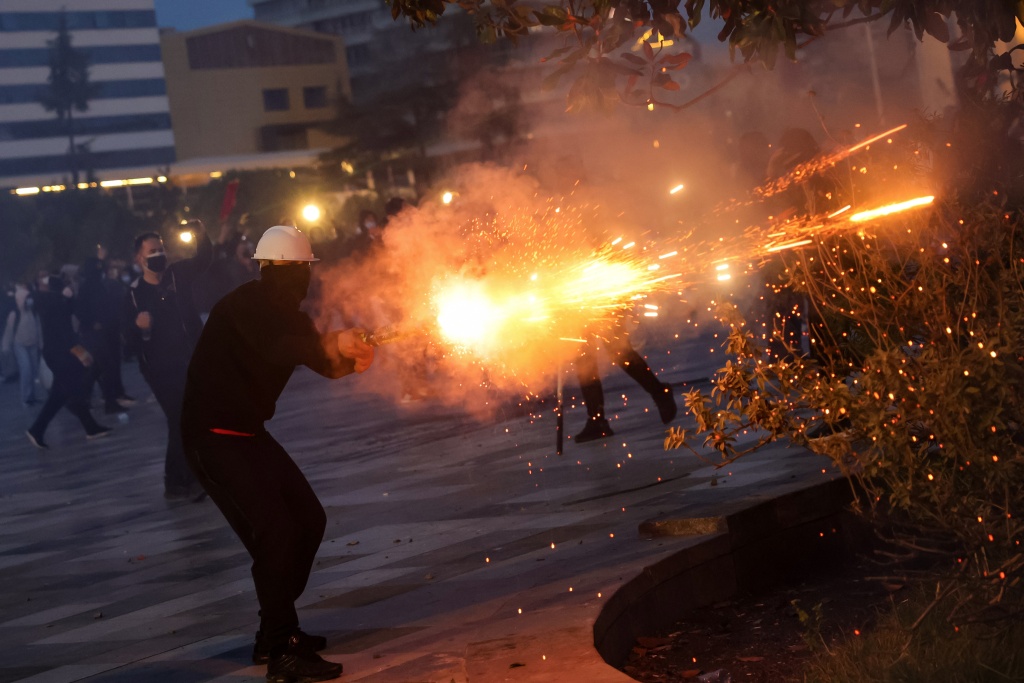 Police fired rubber bullets while some protesters used fireworks against the security forces — Adnan Beci / AFP
