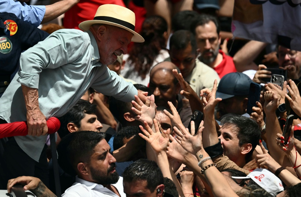 At 80, the veteran leftist Lula is seeking a fourth and final term in office, warning voters that Brazil's sovereignty is at stake in the face of pressure from Trump — Luis ROBAYO / AFP