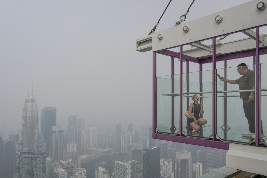Haze from Indonesia fires has drifted across the region, including into neighbouring Malaysia — Mohd Rasfan / AFP