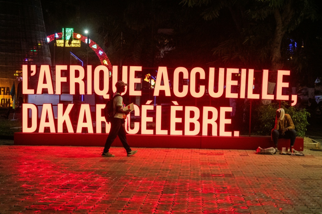 In Dakar  banners and displays proclaim 'Africa welcomes, Dakar celebrates' ahead of the Youth Olympic Games — SEYLLOU / AFP
