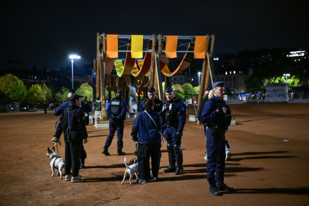 Police imposed curfews in Lyon and other cities — OLIVIER CHASSIGNOLE / AFP