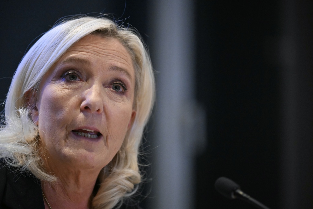 Far-right presidential candidate Marine Le Pen blamed the violence on 'rioters' — NICOLAS TUCAT / AFP